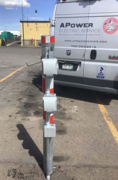 APower service van in front of a truck yard power charging station